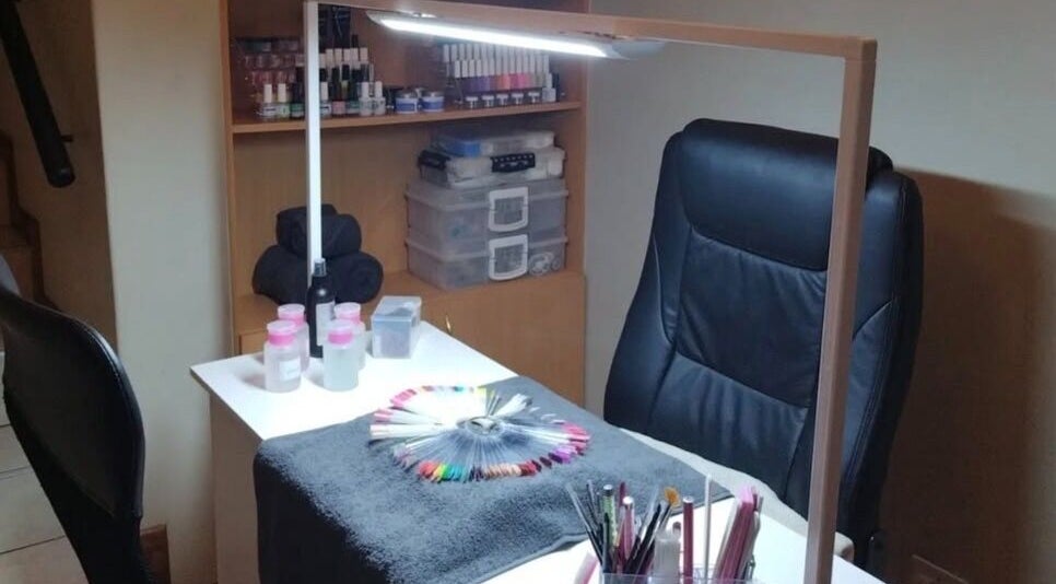 Manicure station at Lehova Nails & Beauty in Pretoria, Gauteng, ZA, featuring nail polish and tools.
