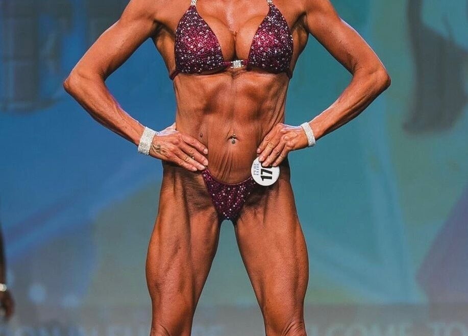 Bodybuilding competition at Be Better Posing Coaching, Coventry, England, GB showcasing a contestant on stage.