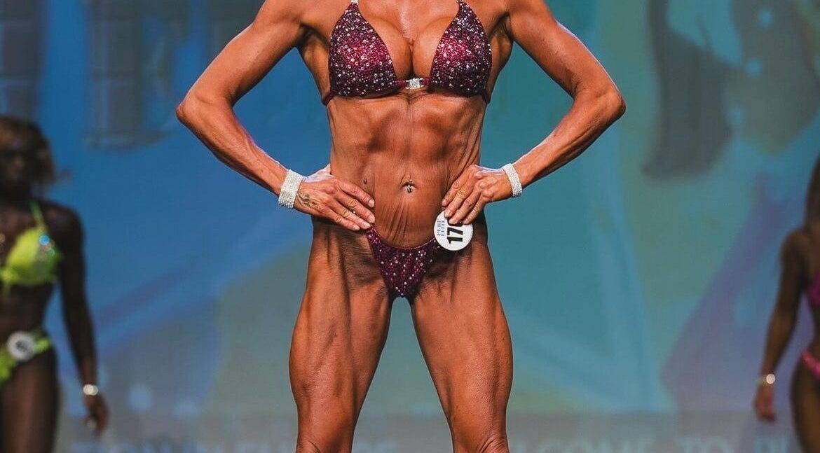 Bodybuilding competition at Be Better Posing Coaching, Coventry, England, GB showcasing a contestant on stage.