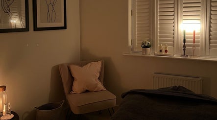 Cozy massage room at Rosie Holland Holistic Massage, Shipston-on-Stour, England, GB with soft lighting and decor.