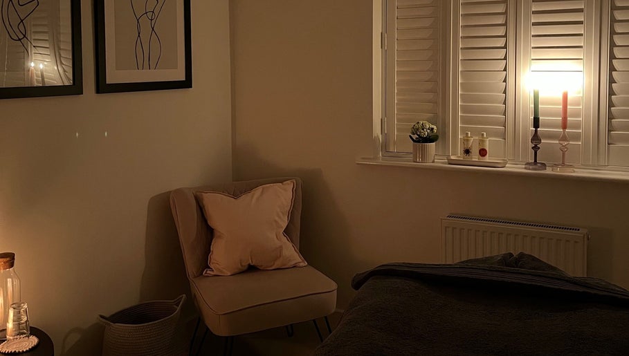 Cozy massage room at Rosie Holland Holistic Massage, Shipston-on-stour, England, GB, with soft lighting.