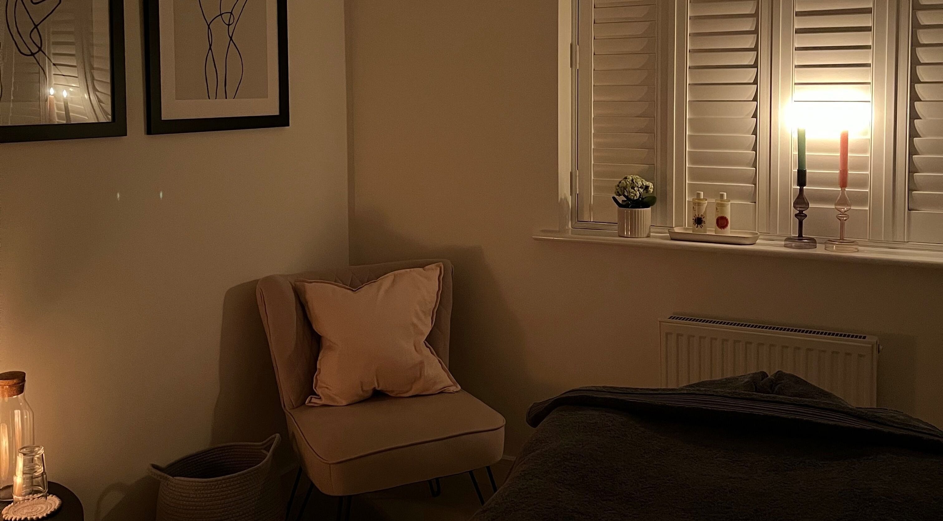 Cozy massage room at Rosie Holland Holistic Massage, Shipston-on-stour, England, GB, with soft lighting.