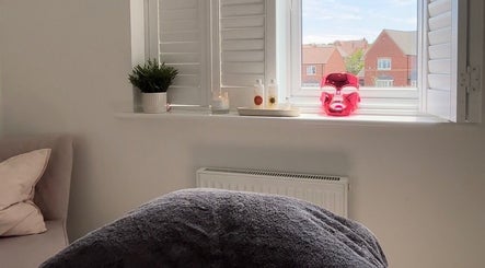 Calming massage room at Rosie Holland Holistic Massage, Shipston-on-stour, England, showcasing luxury and relaxation.