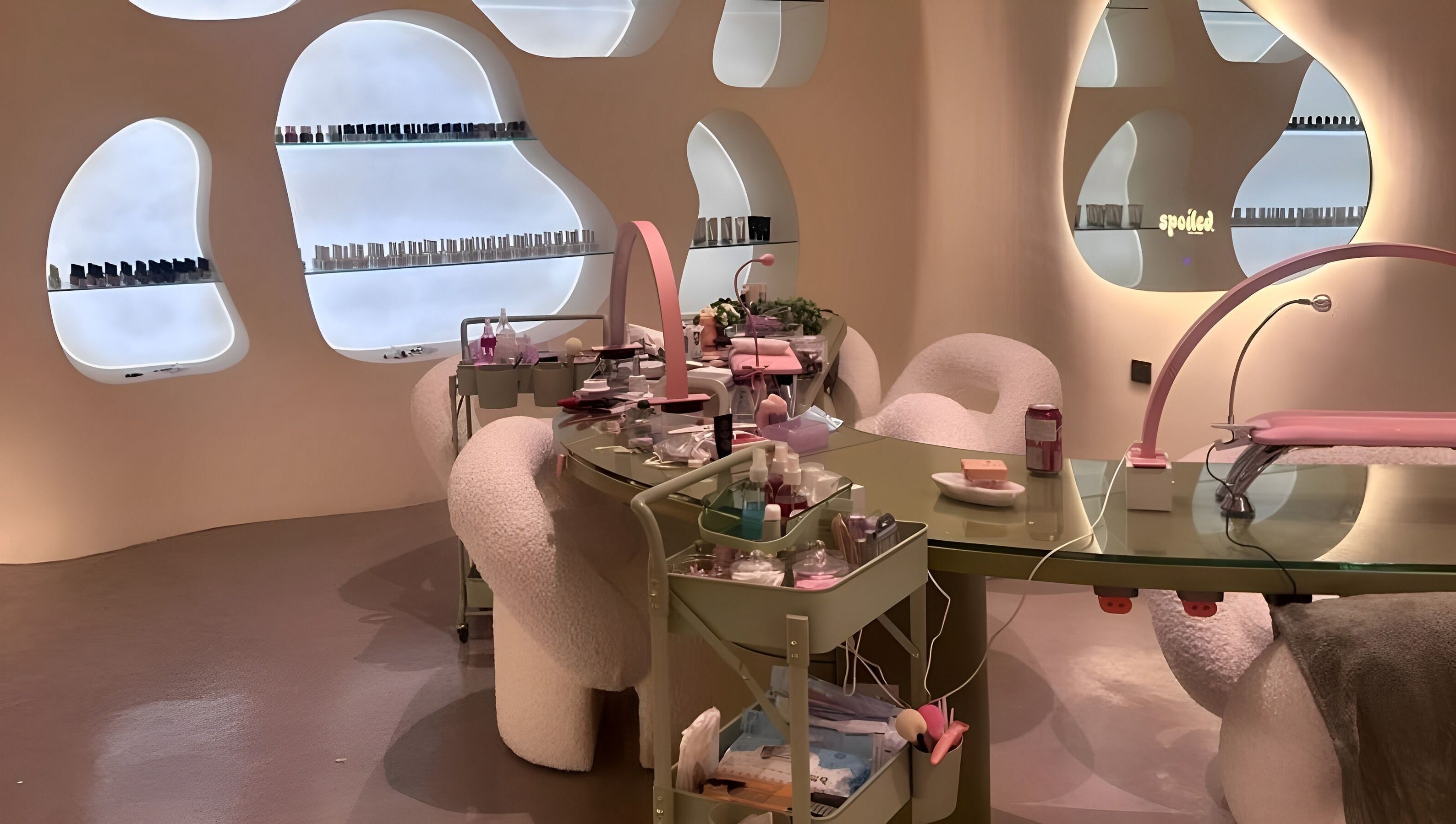 Sleek interior of Spoiled Nail Studio, Riyadh, showcasing modern nail care setup and chic decor.