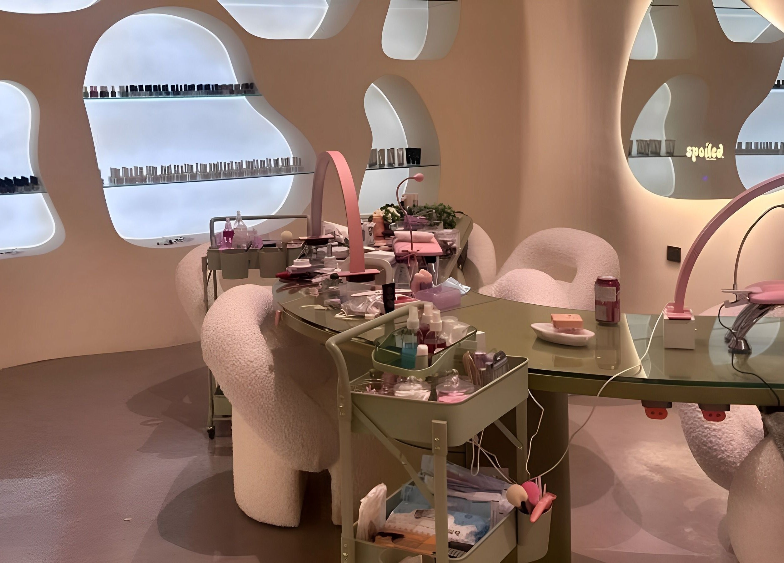 Sleek interior of Spoiled Nail Studio, Riyadh, showcasing modern nail care setup and chic decor.
