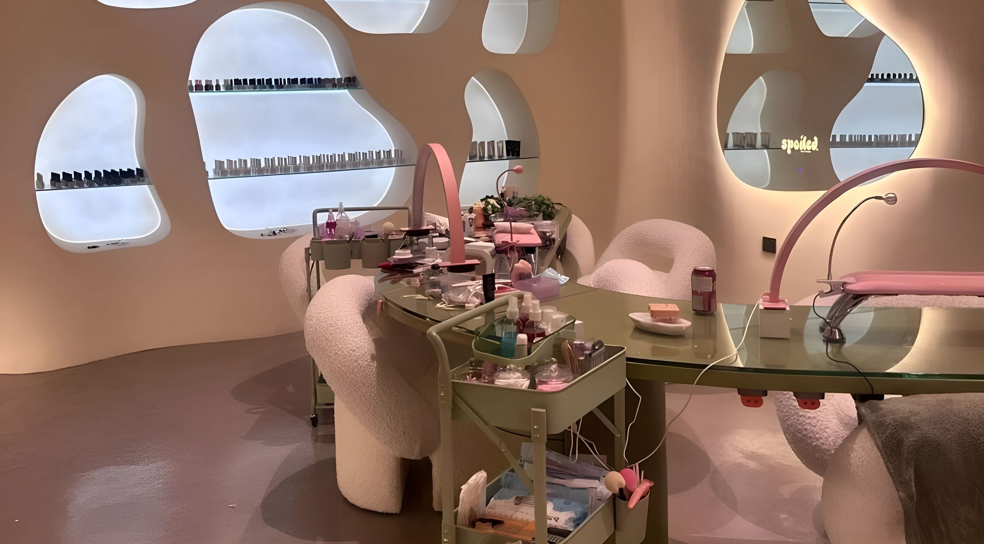 Sleek interior of Spoiled Nail Studio, Riyadh, showcasing modern nail care setup and chic decor.
