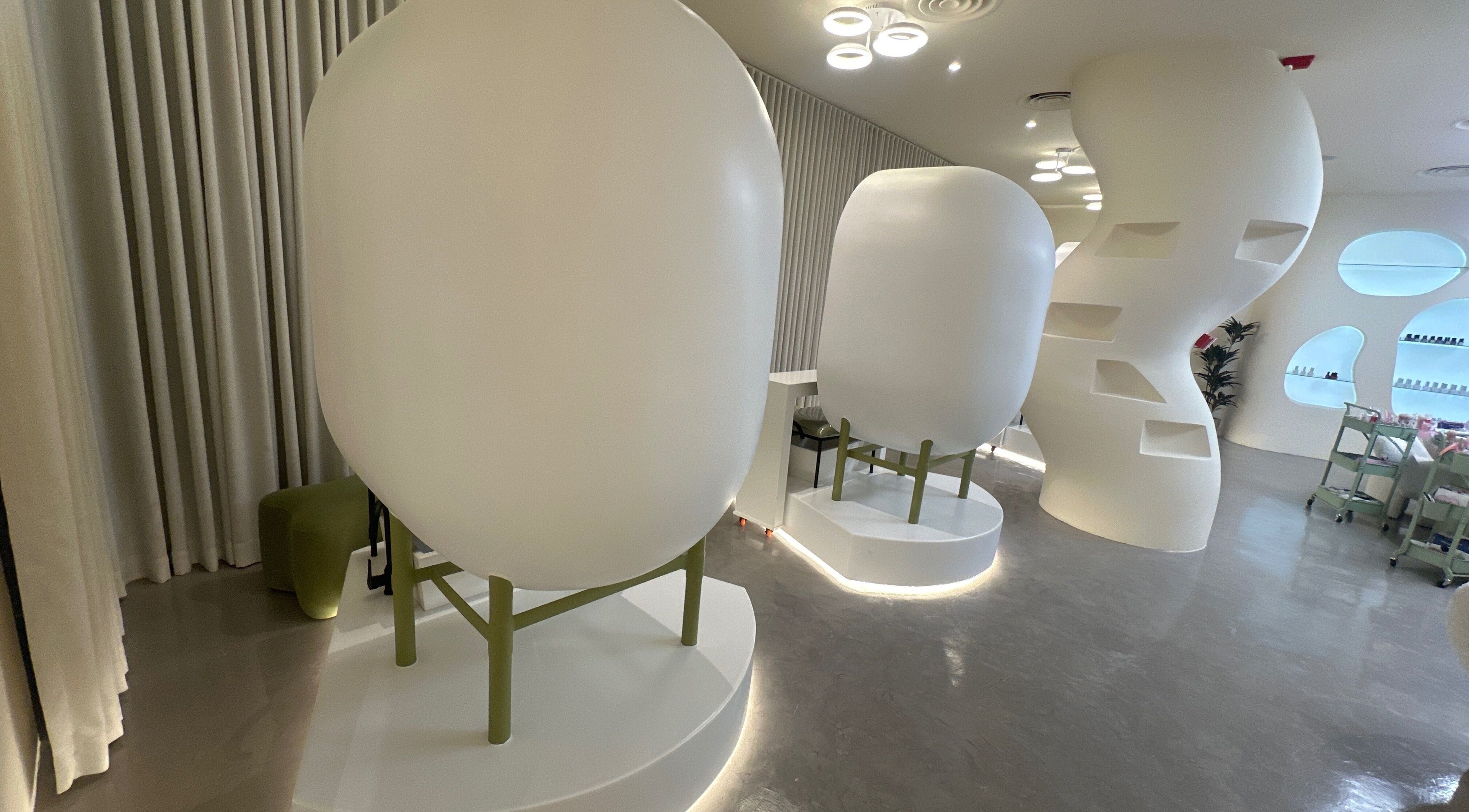 Chic pod seating at Spoiled Nail Studio, Riyadh, Riyadh Province, SA enhances the luxurious ambiance.
