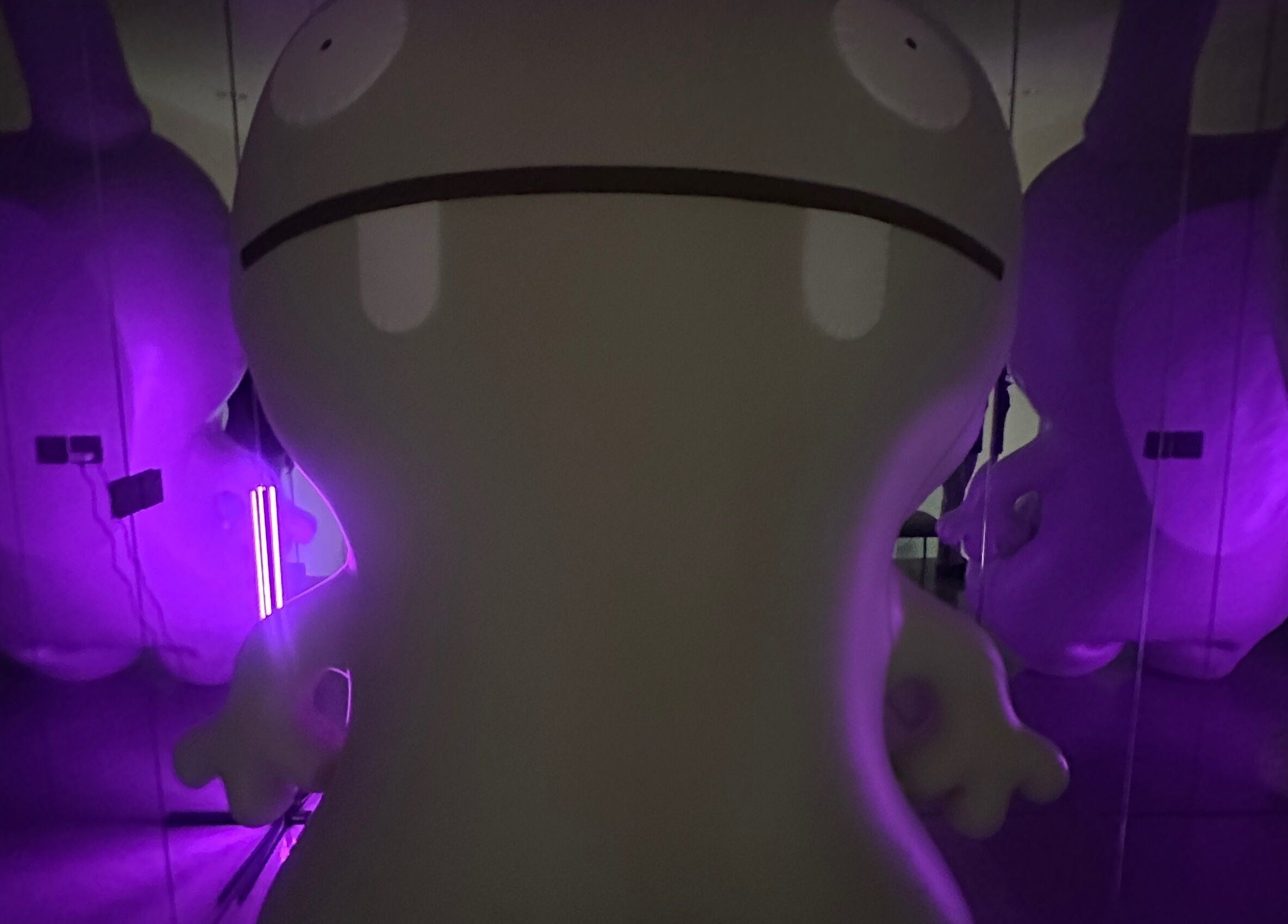 Unique mascot in purple glow at Spoiled Nail Studio, Riyadh, Riyadh Province, SA.