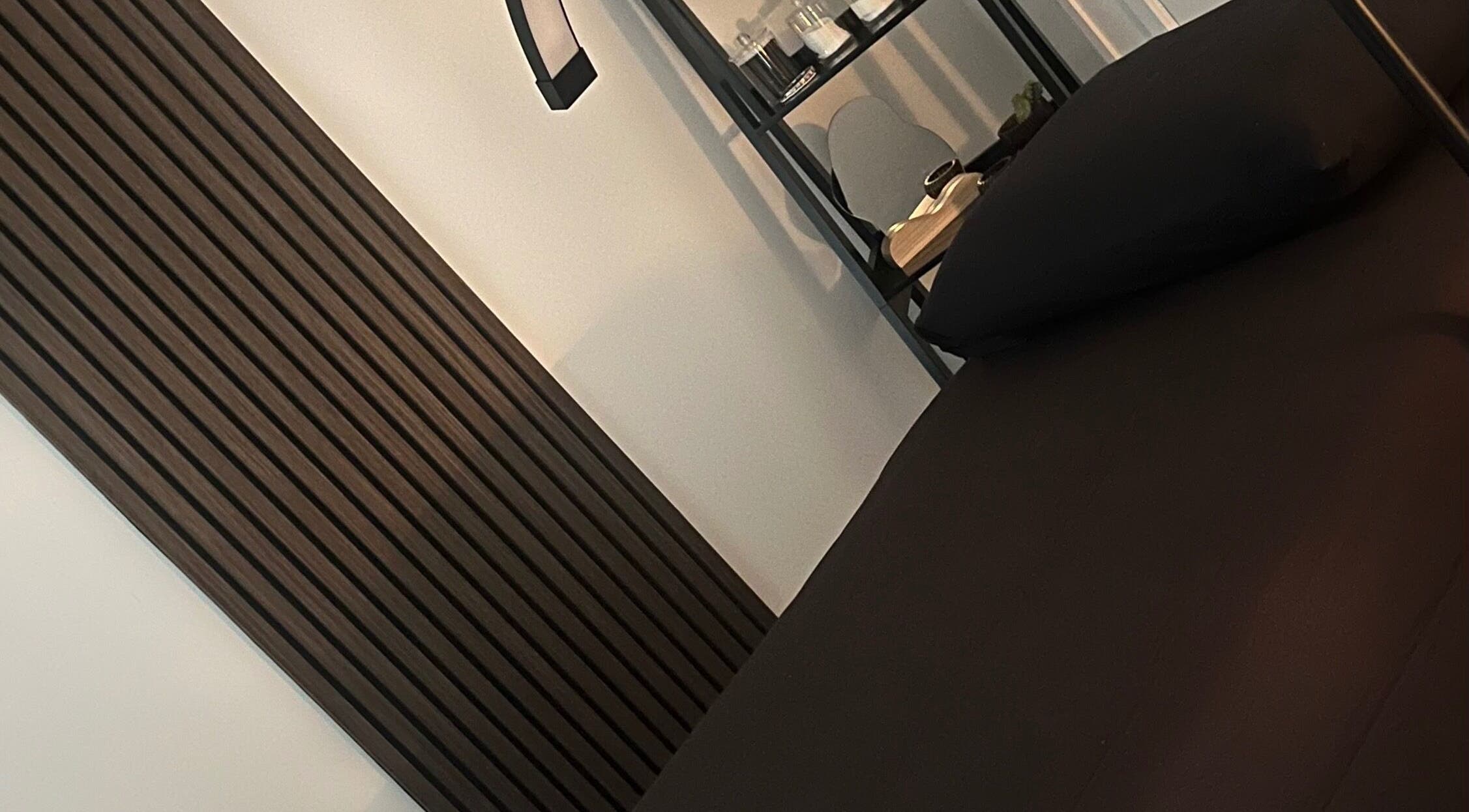 Relaxing treatment room at Afterglow by KC, Coatbridge, Scotland, GB with modern decor.