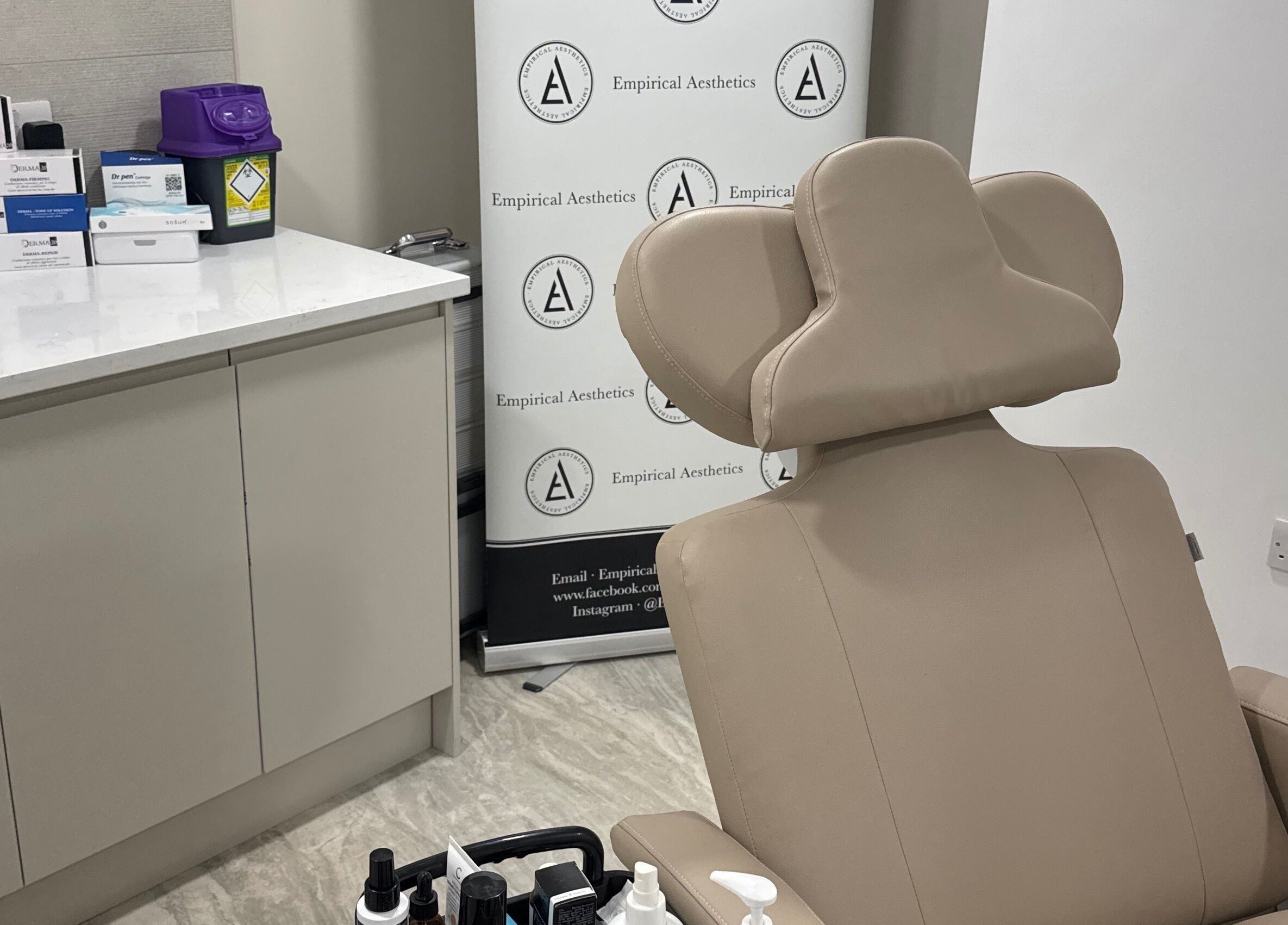 Empirical Aesthetics treatment room in St Helens, England, GB features a comfortable beige chair.