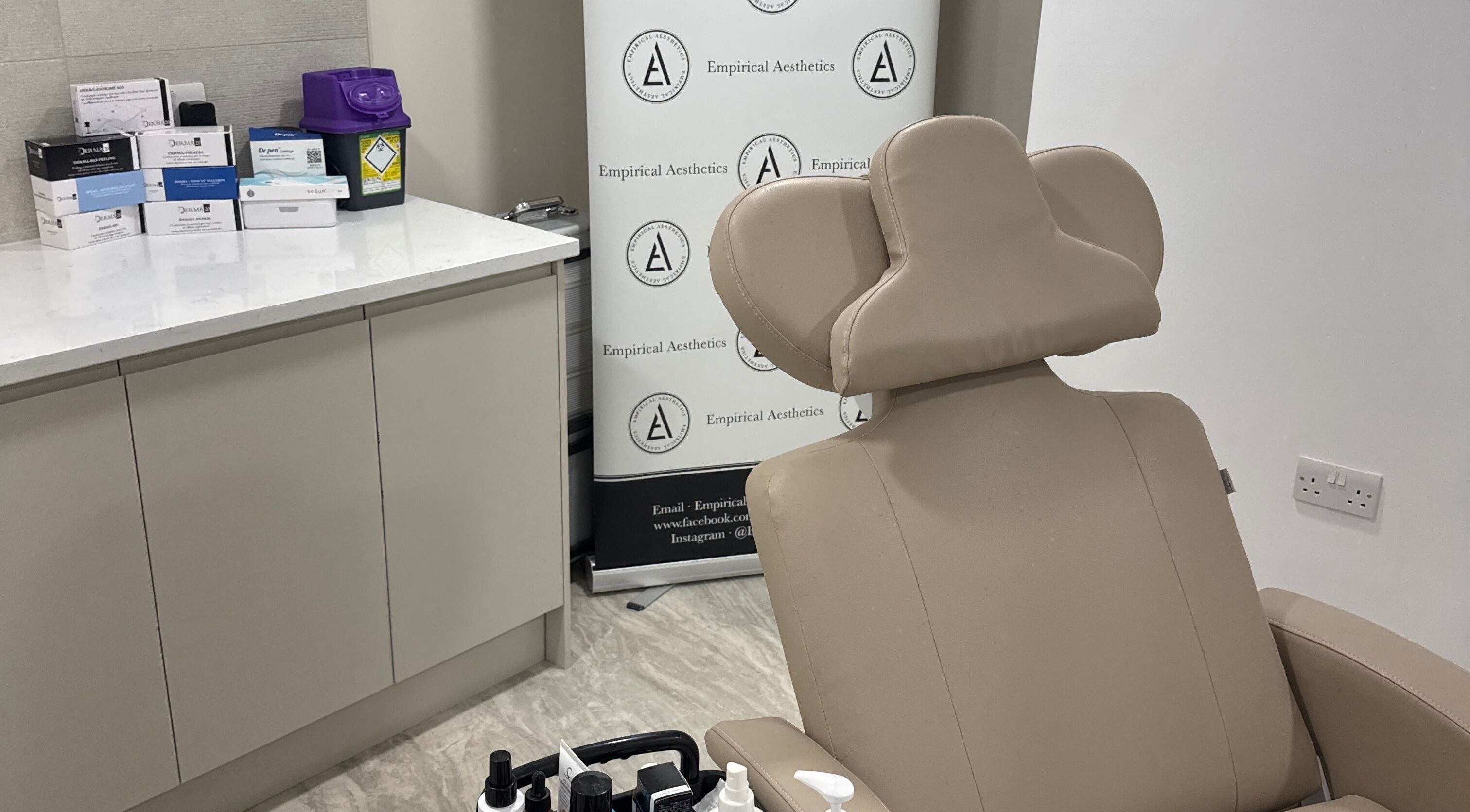 Empirical Aesthetics treatment room in St Helens, England, GB features a comfortable beige chair.