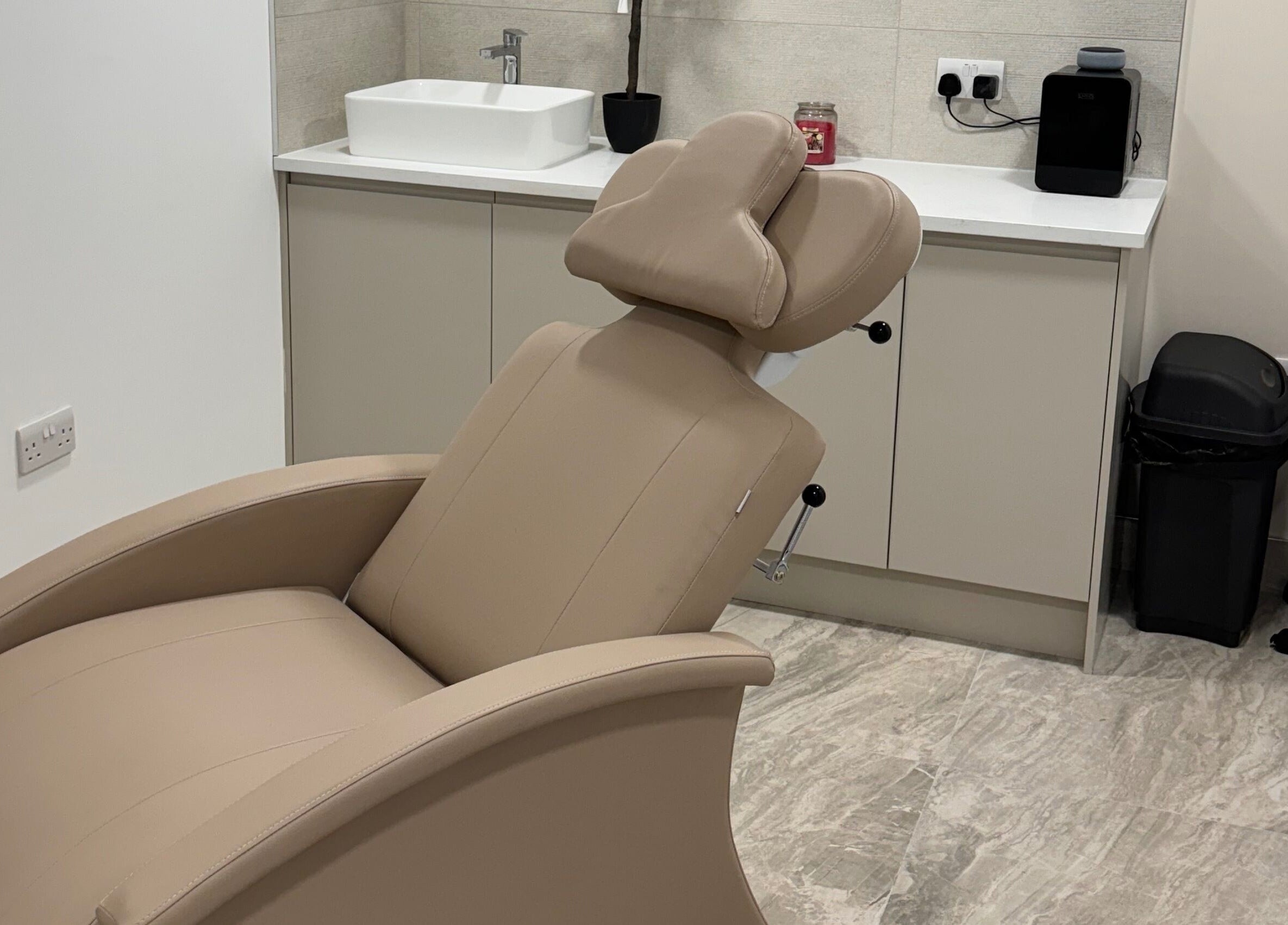 Luxury treatment chair at Empirical Aesthetics, St Helens, England, GB, offering ultimate comfort.