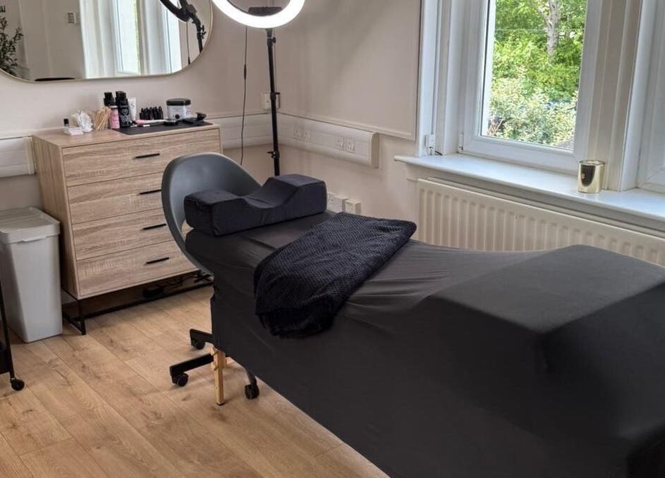 Relaxing lash treatment room at KMW Lashes, Bathgate, Scotland, GB with modern decor and large window views.