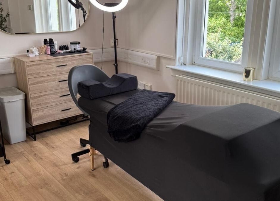 Relaxing lash treatment room at KMW Lashes, Bathgate, Scotland, GB with modern decor and large window views.
