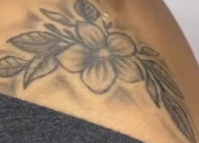 Detailed floral tattoo design at Spoilt Beauty in Coggeshall Essex, Coggeshall, England, GB.
