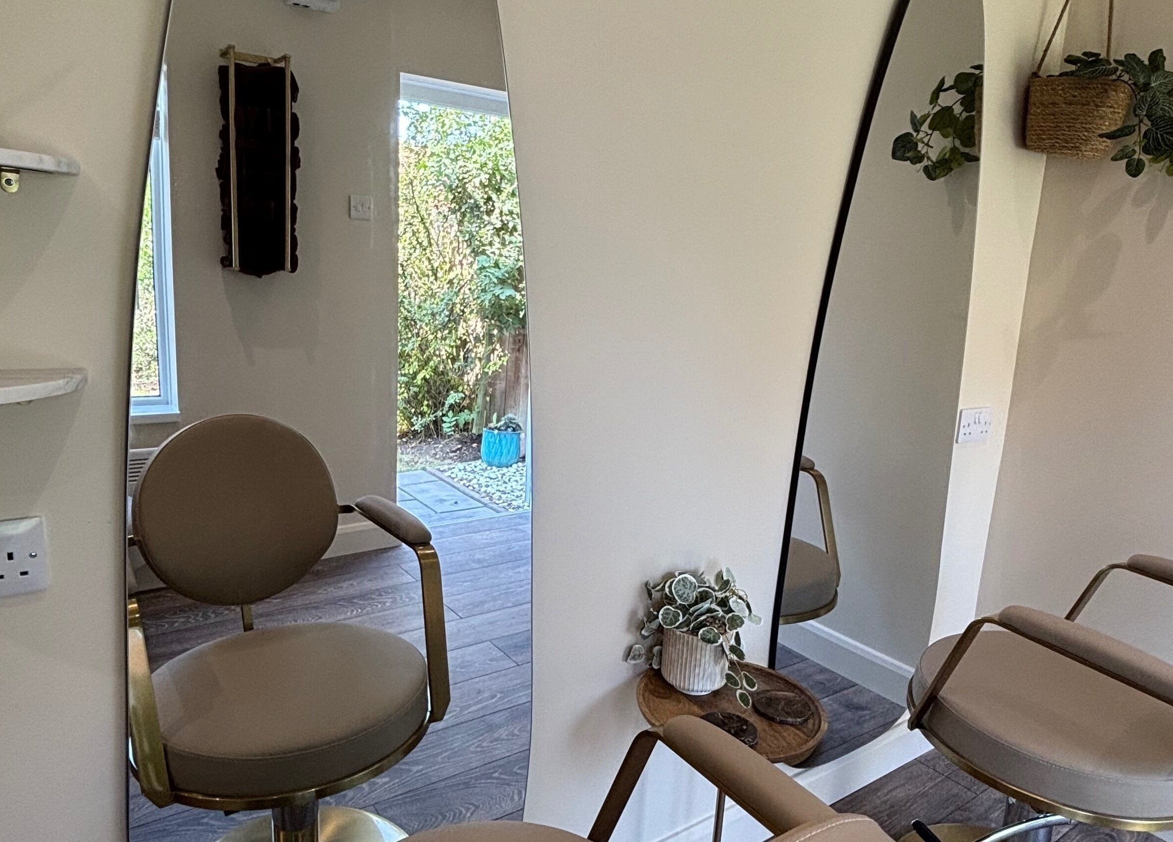 Chic salon chair and mirror at Studio G., Gateshead, England, GB, exuding modern elegance and style.