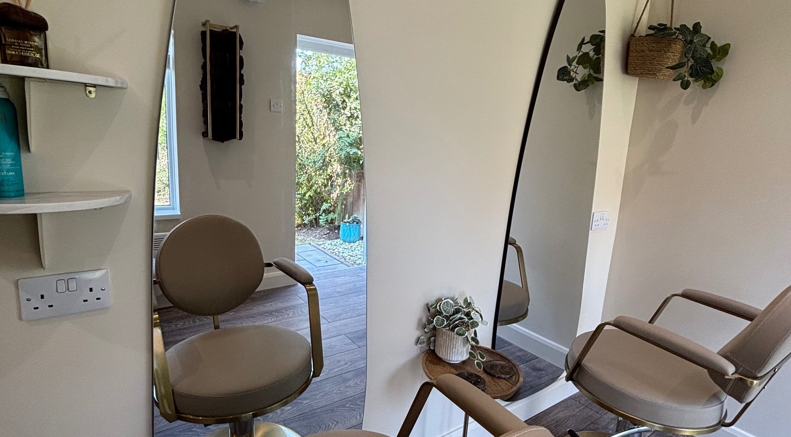 Chic salon chair and mirror at Studio G., Gateshead, England, GB, exuding modern elegance and style.