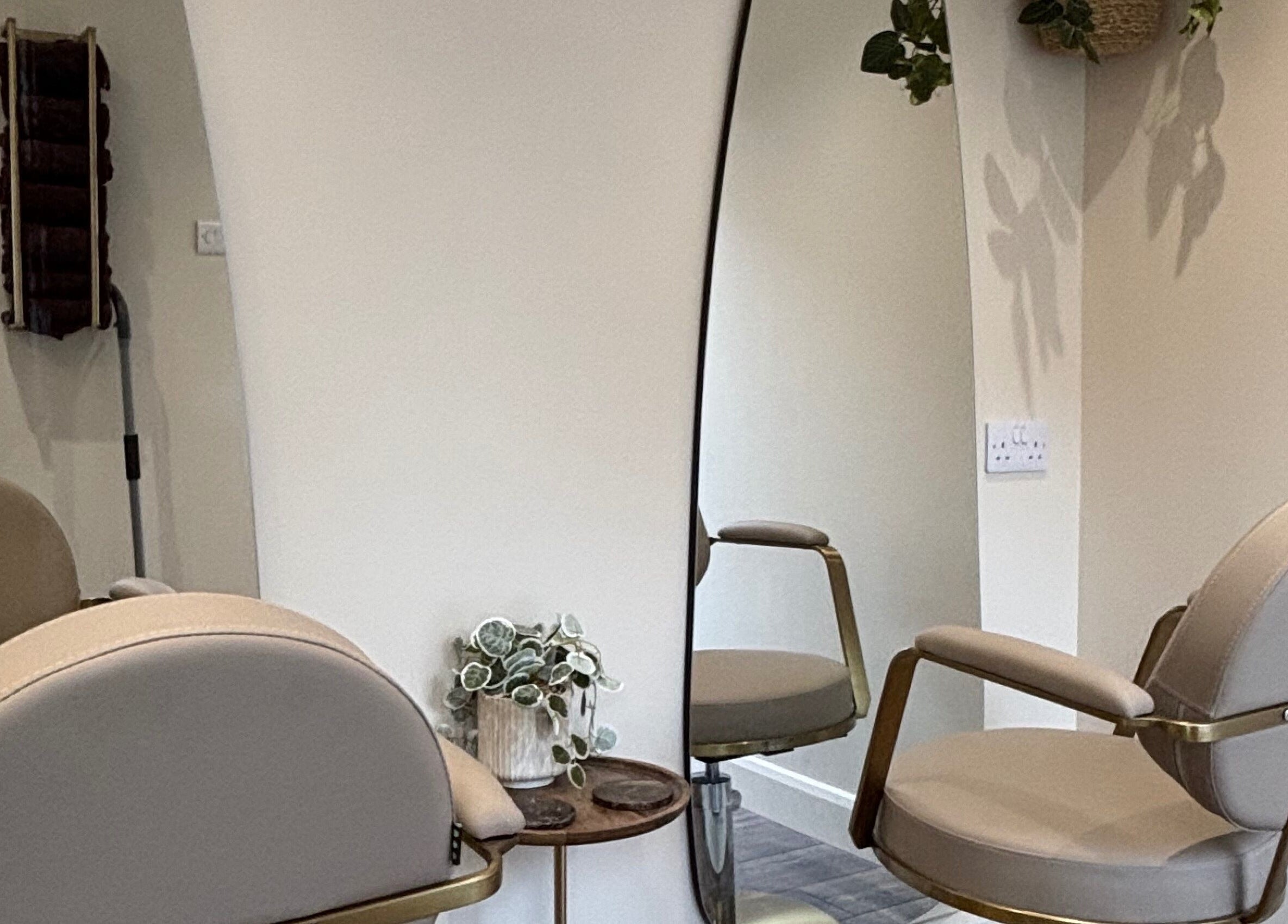Luxurious salon chair and mirror at Studio G. in Gateshead, England, GB, offering a chic beauty experience.