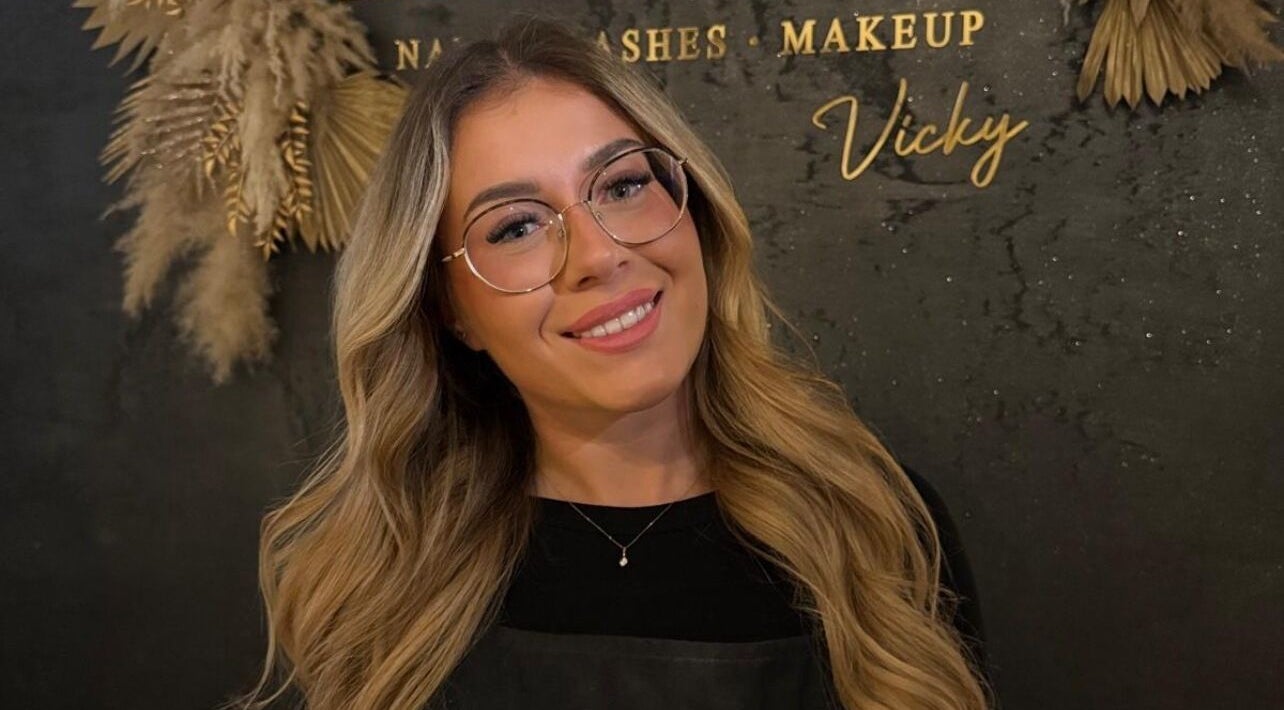 Professional stylist at The Beauty Room Vicky, Birmingham, England, GB, displaying styled hair.