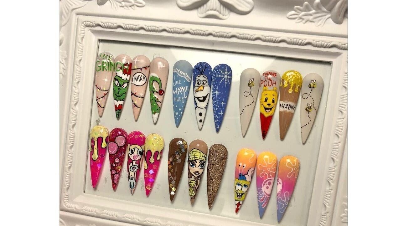 Colorful cartoon nail art at The Beauty Room Vicky, Birmingham, England, GB, showcasing creative designs.