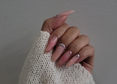 Stylish manicured nails with gems at Formation Beauty Lounge, Vancouver, British Columbia, CA.