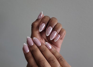 Stylish manicure at Formation Beauty Lounge, Vancouver, British Columbia, CA. Neutral color with white tips.