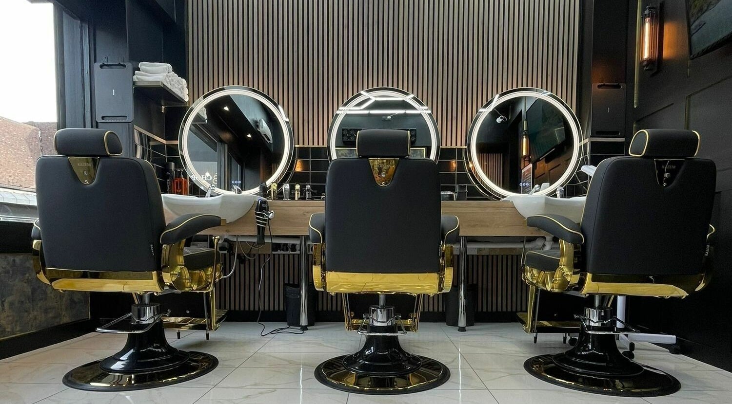 Luxurious barber chairs at Chopafellas, Wickford, England, GB, offering a stylish grooming experience.