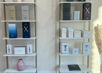 Sleek shelves of beauty products at Oasis Aesthetics Spa - Ness in Winnipeg, Manitoba, CA.
