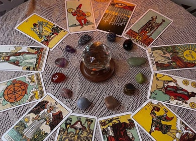 Tarot cards and crystals at Indigo Wellness, Falmouth, England, GB, creating a mystical ambiance.