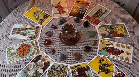 Tarot cards and crystals at Indigo Wellness, Falmouth, England, GB, creating a mystical ambiance.
