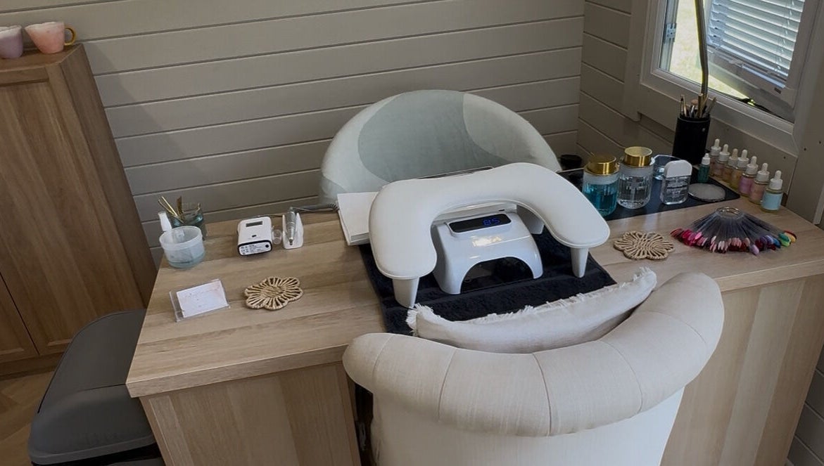 Elegant nail station at Bellisamani in Rickmansworth, England, GB, showcasing modern manicure setup and tools.