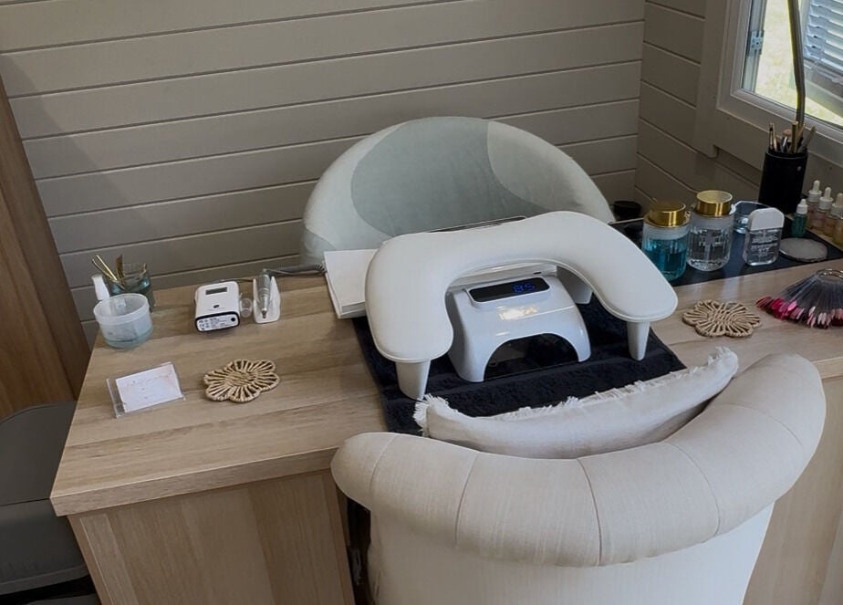 Elegant nail station at Bellisamani in Rickmansworth, England, GB, showcasing modern manicure setup and tools.