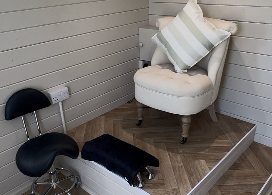 Cozy seating area at Bellisamani, Rickmansworth, England, GB offering comfort and relaxation.