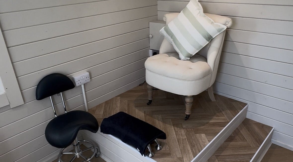 Cozy seating area at Bellisamani, Rickmansworth, England, GB offering comfort and relaxation.