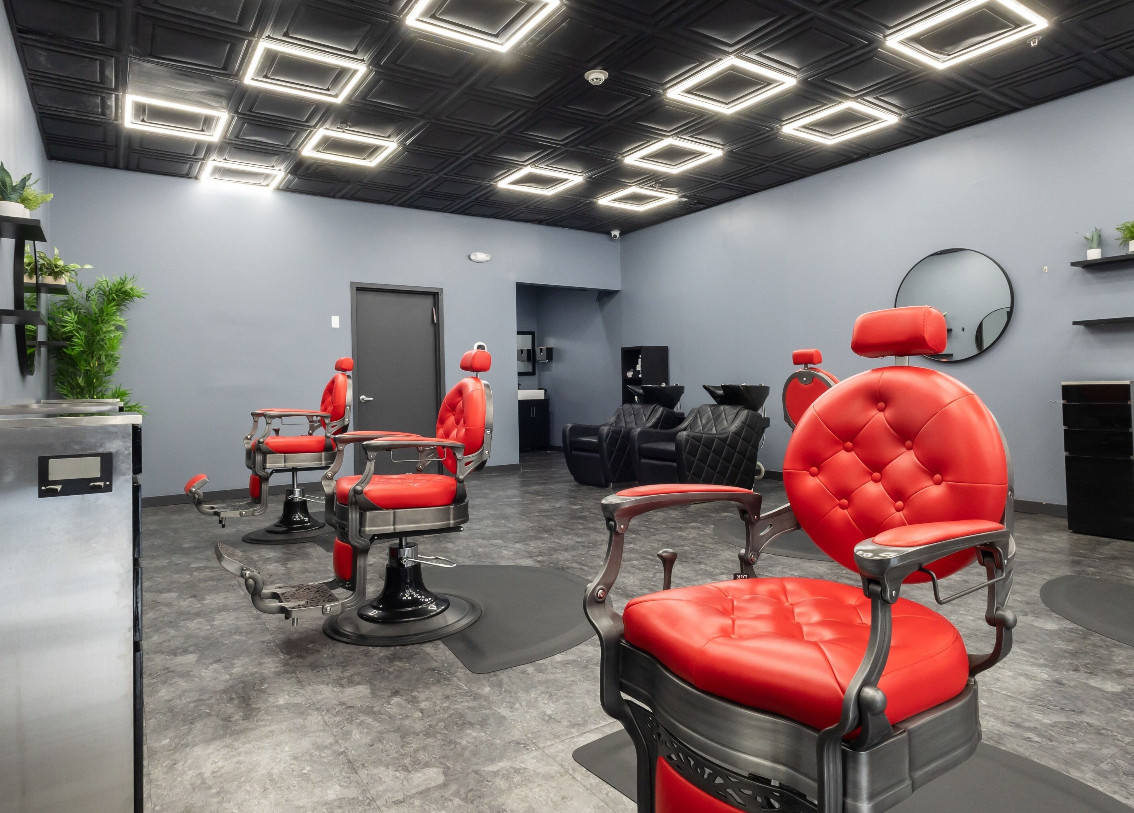 YuroCuts Garnerville's stylish interior with red barber chairs in Mount Ivy, New York, US.