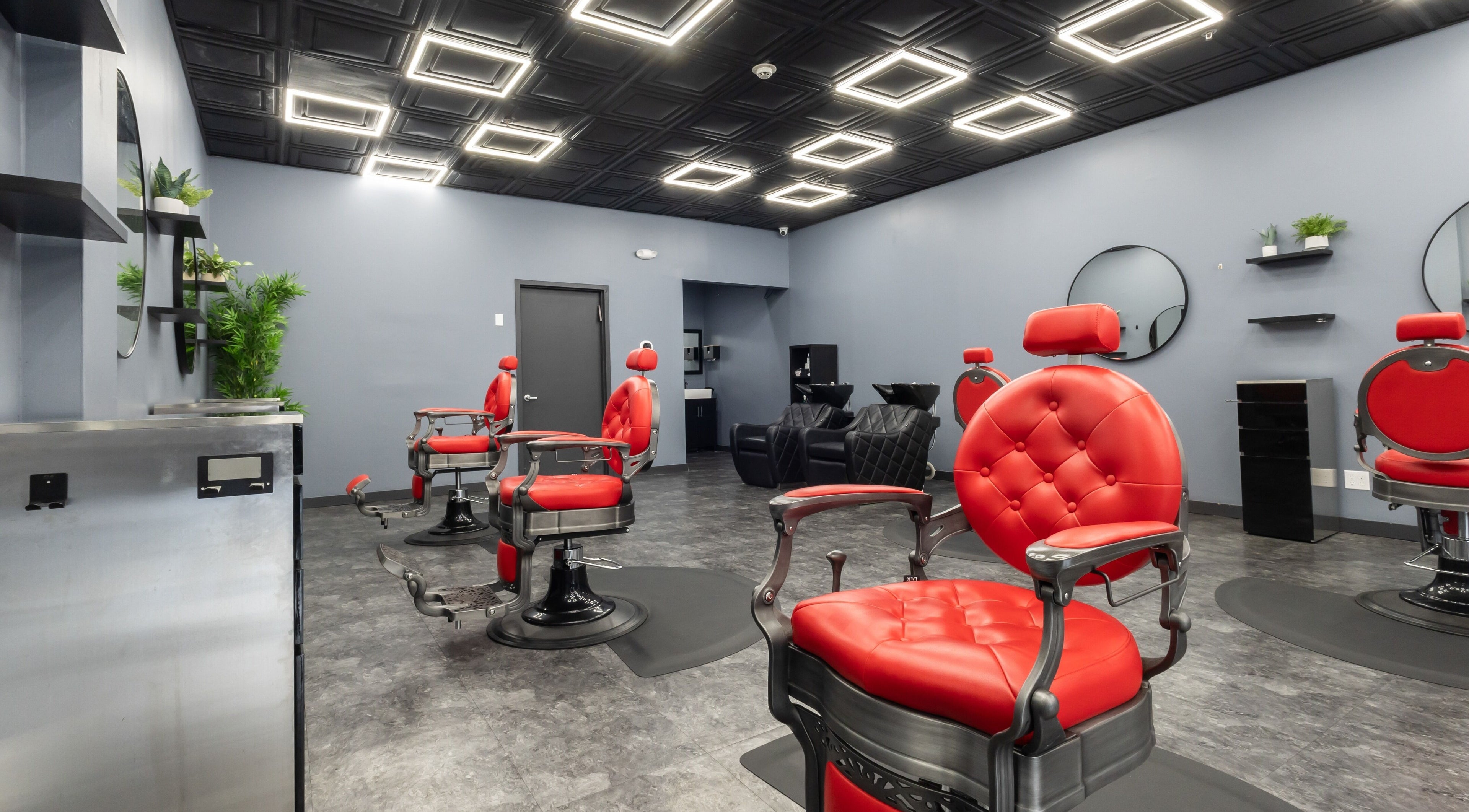 YuroCuts Garnerville's stylish interior with red barber chairs in Mount Ivy, New York, US.