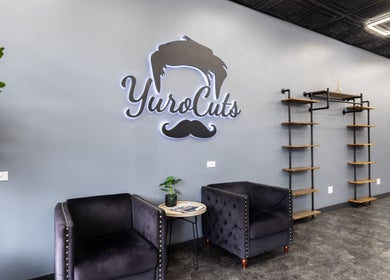 YuroCuts Garnerville's stylish lounge with velvet chairs in Mount Ivy, New York, US.