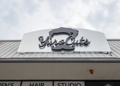 YuroCuts Garnerville exterior sign in Mount Ivy, New York, US, featuring bold modern logo design.