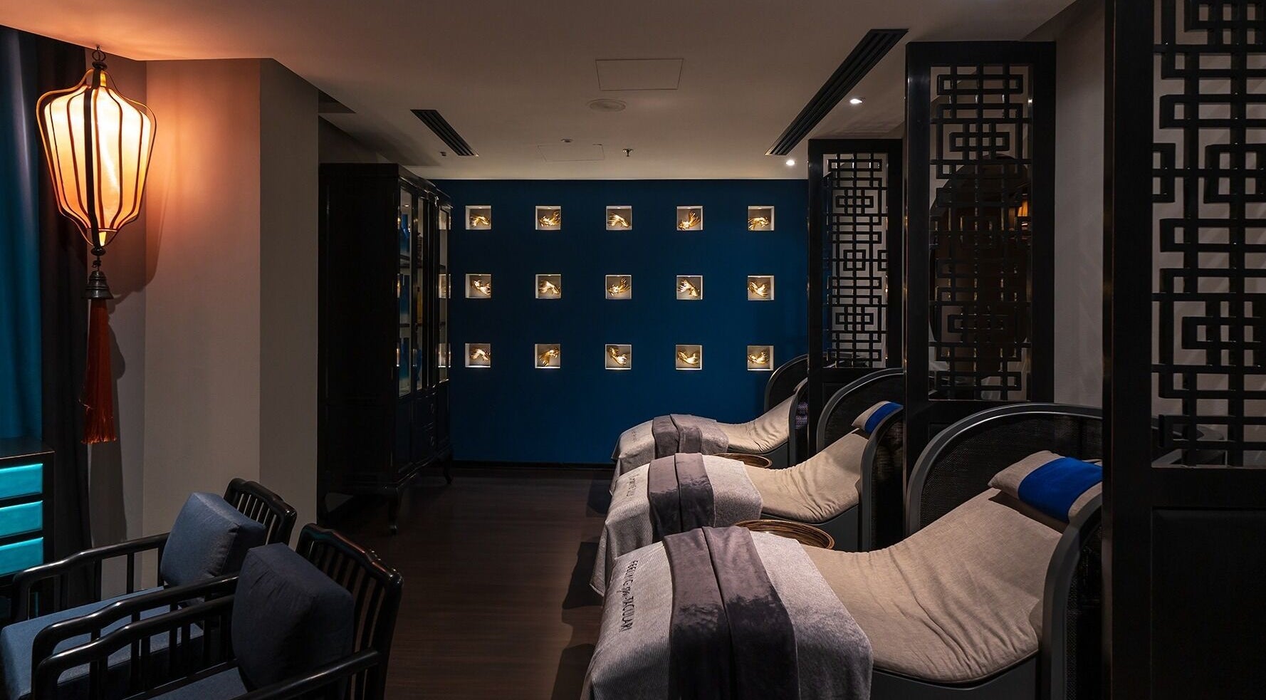 Relaxing lounge at SENSASIA - The Village (Ladies Only), Dubai, Dubai, AE with ambient lighting and cozy seating.