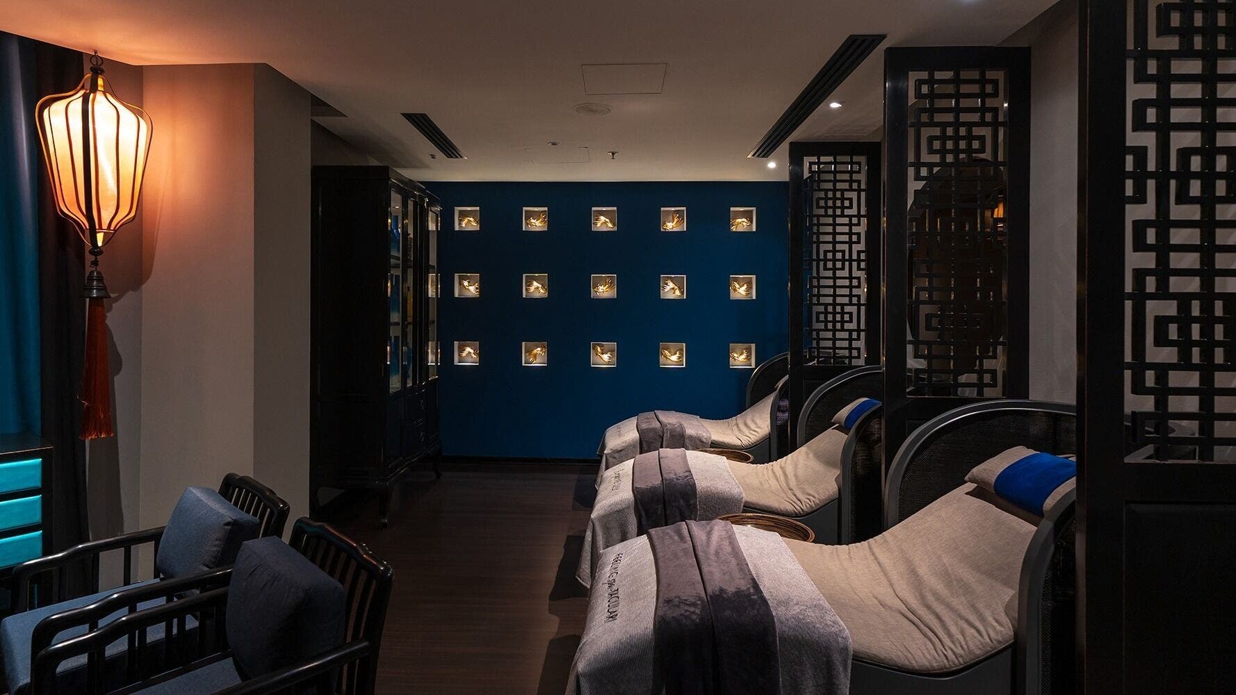 Relaxing lounge at SENSASIA - The Village (Ladies Only), Dubai, Dubai, AE with ambient lighting and cozy seating.