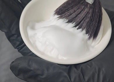 A small bowl of white foam with brush at Nature's Beauty, Ridgehaven, South Australia, AU.