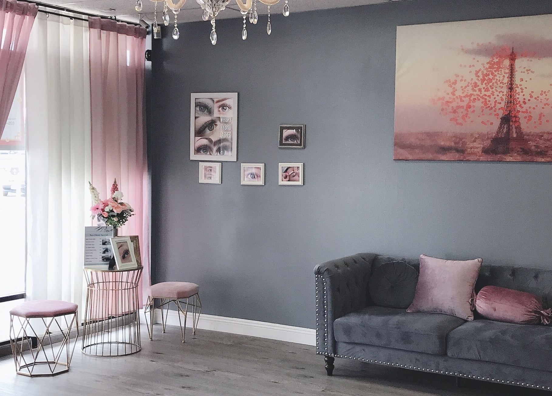 Elegant J.S beauty zone lounge in Covina, California, US with pink accents and cozy seating.