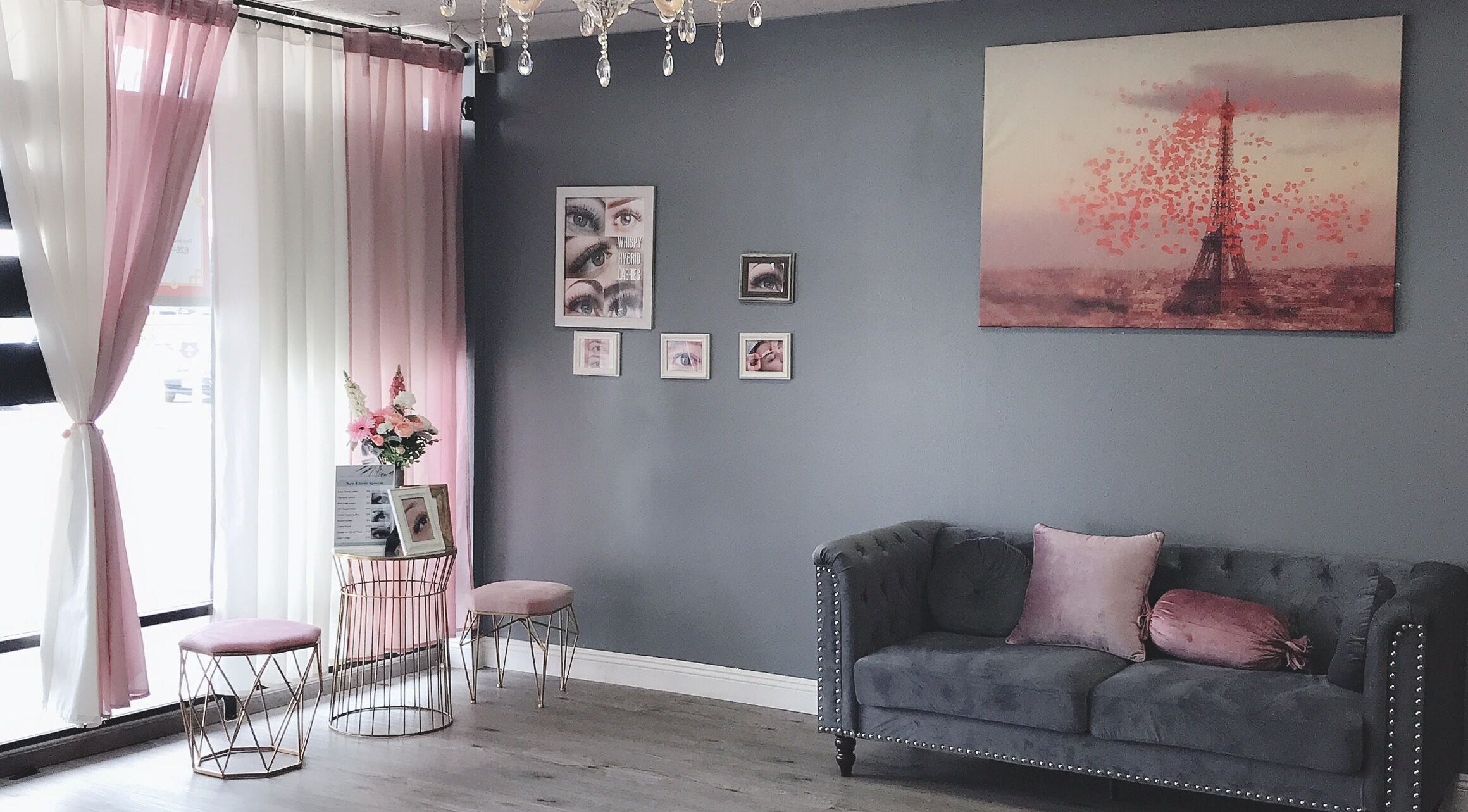 Elegant J.S beauty zone lounge in Covina, California, US with pink accents and cozy seating.