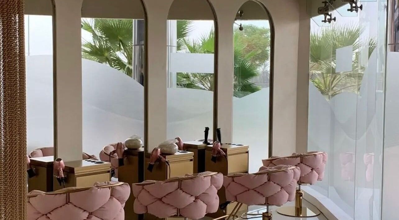 Elegant pink seating and styling stations inside HOME SERVICE - PINK PLASTIC SALON, Dubai, Dubai, AE.
