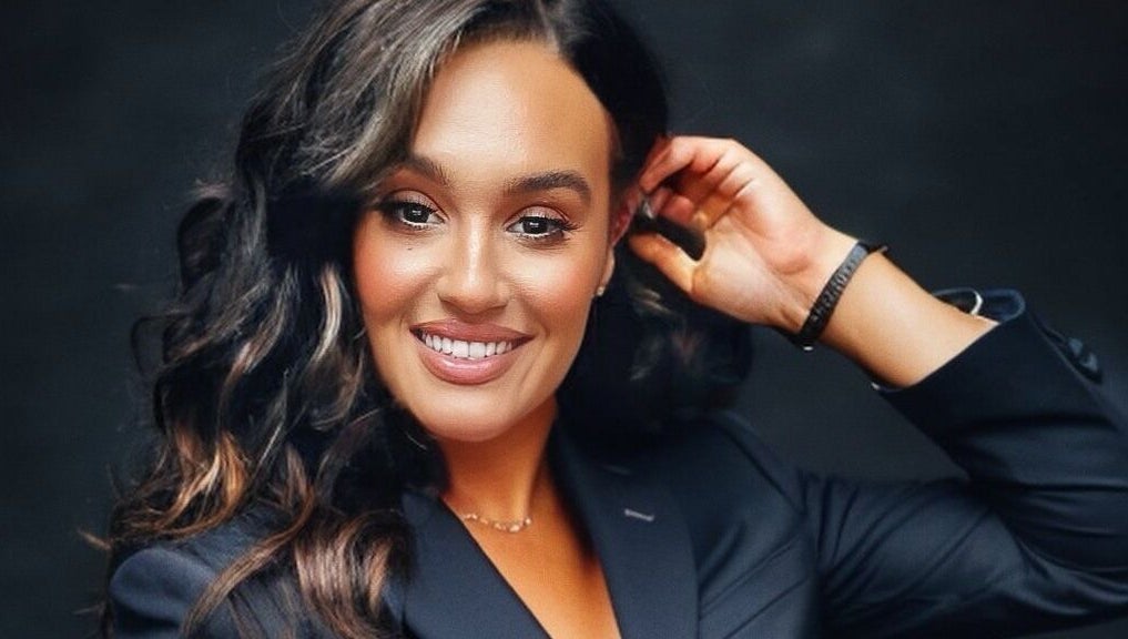 Smiling individual in stylish attire at SA Artistry, Arklow, County Wicklow, IE showcasing beauty and confidence.