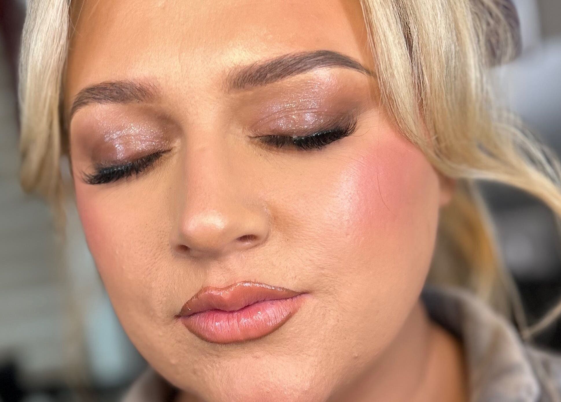 Close-up of a woman's face with glowing makeup from SA Artistry, Arklow, County Wicklow, IE.