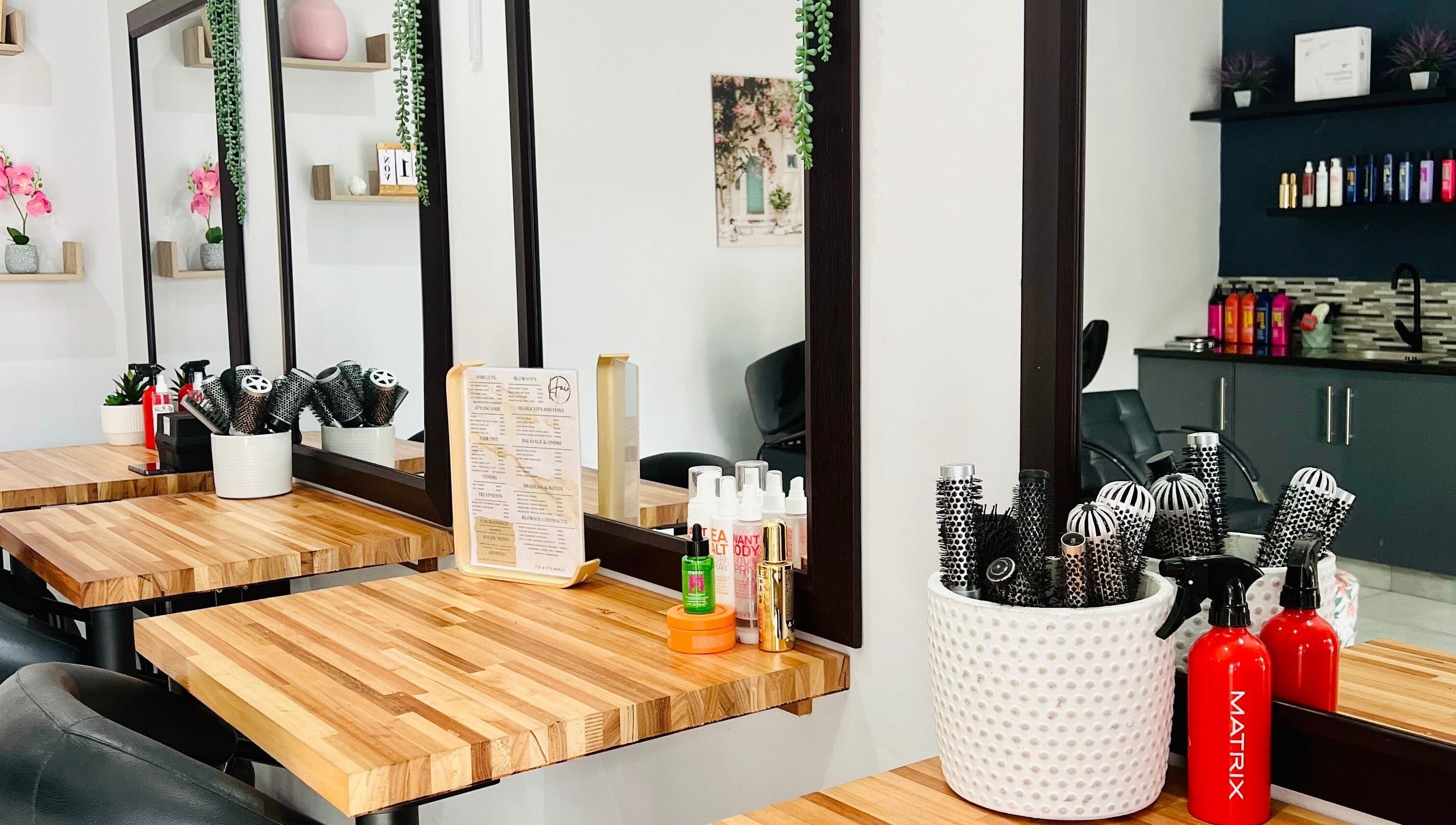 Stylish wooden counter with hair tools at Hair Vogue Salon, Hillcrest, Kwazulu-natal, ZA.