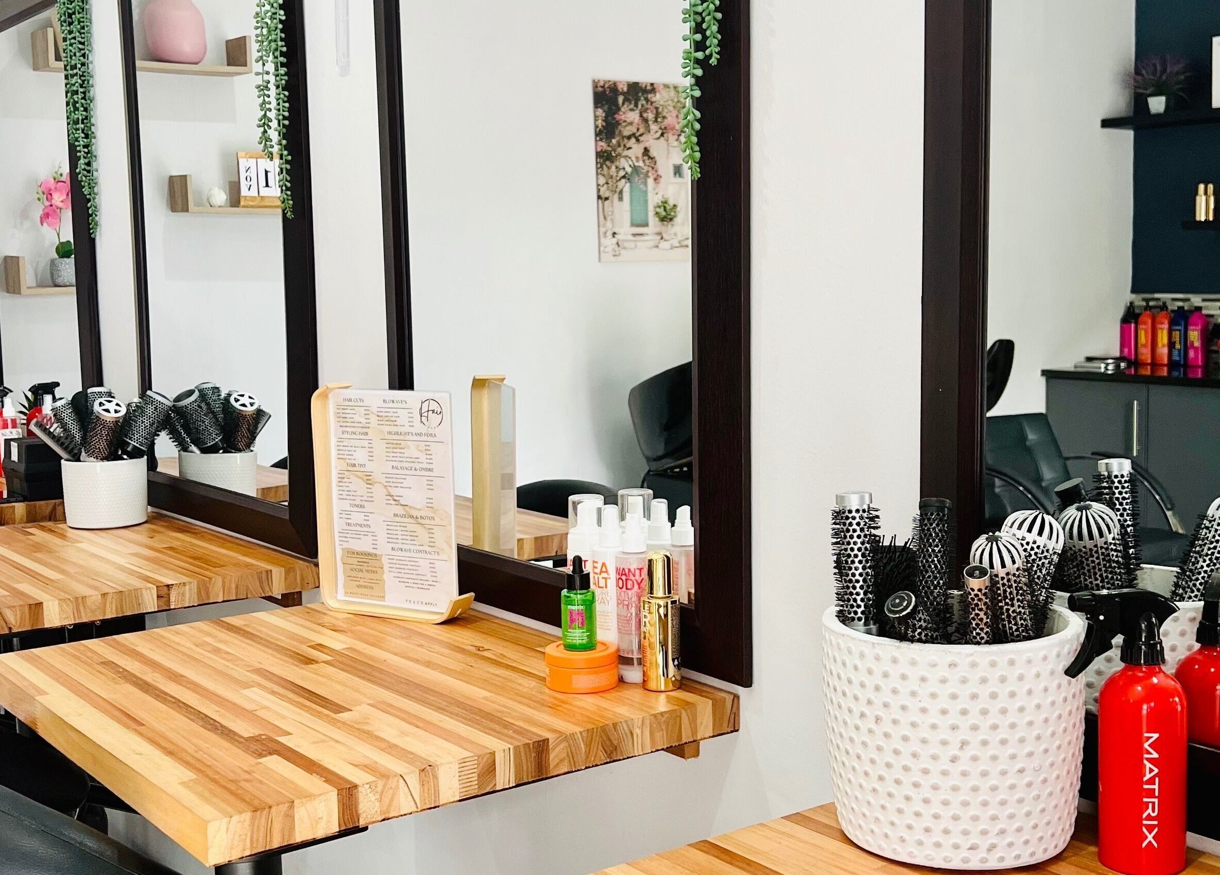 Stylish wooden counter with hair tools at Hair Vogue Salon, Hillcrest, Kwazulu-natal, ZA.
