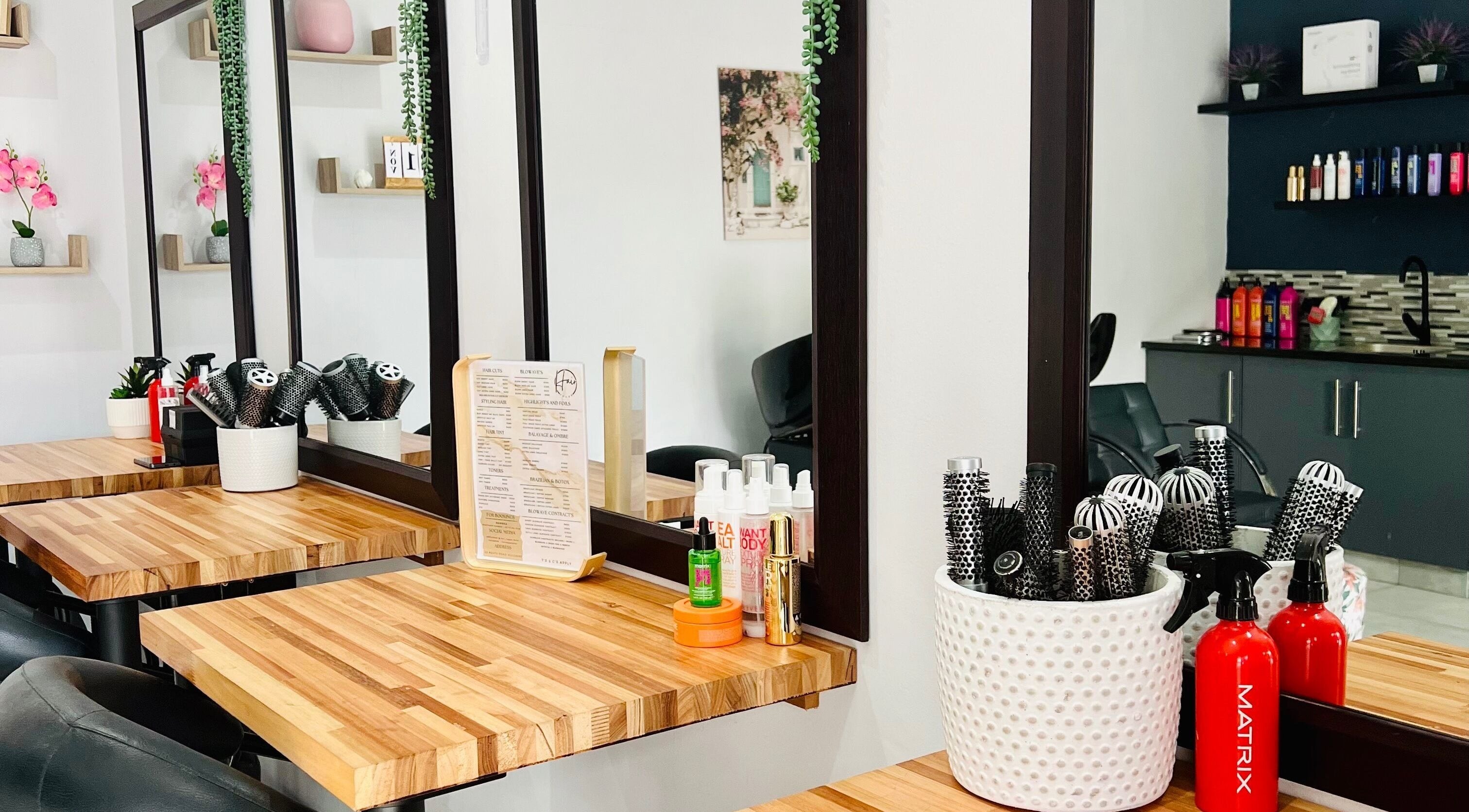 Stylish wooden counter with hair tools at Hair Vogue Salon, Hillcrest, Kwazulu-natal, ZA.