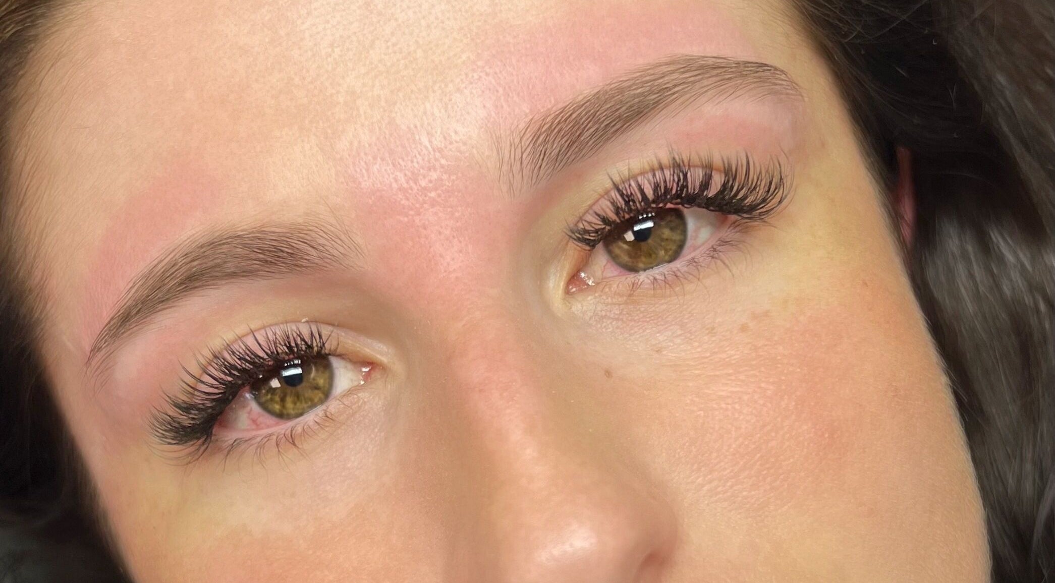Close-up of expertly shaped eyebrows and lashes at Linas Lashes & Brows, High Wycombe, England, GB.
